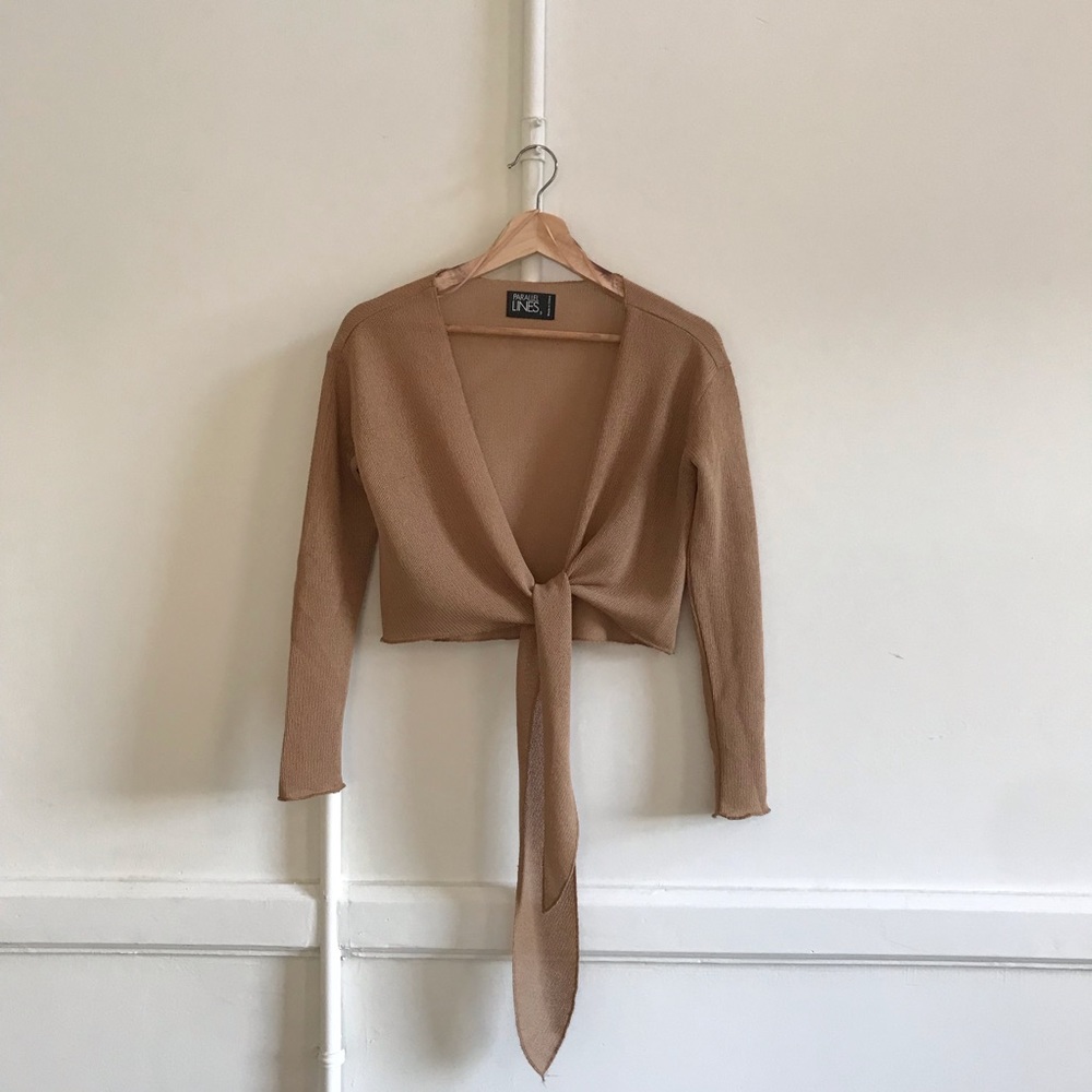 Parallel lines knitted tie front long sleeved top